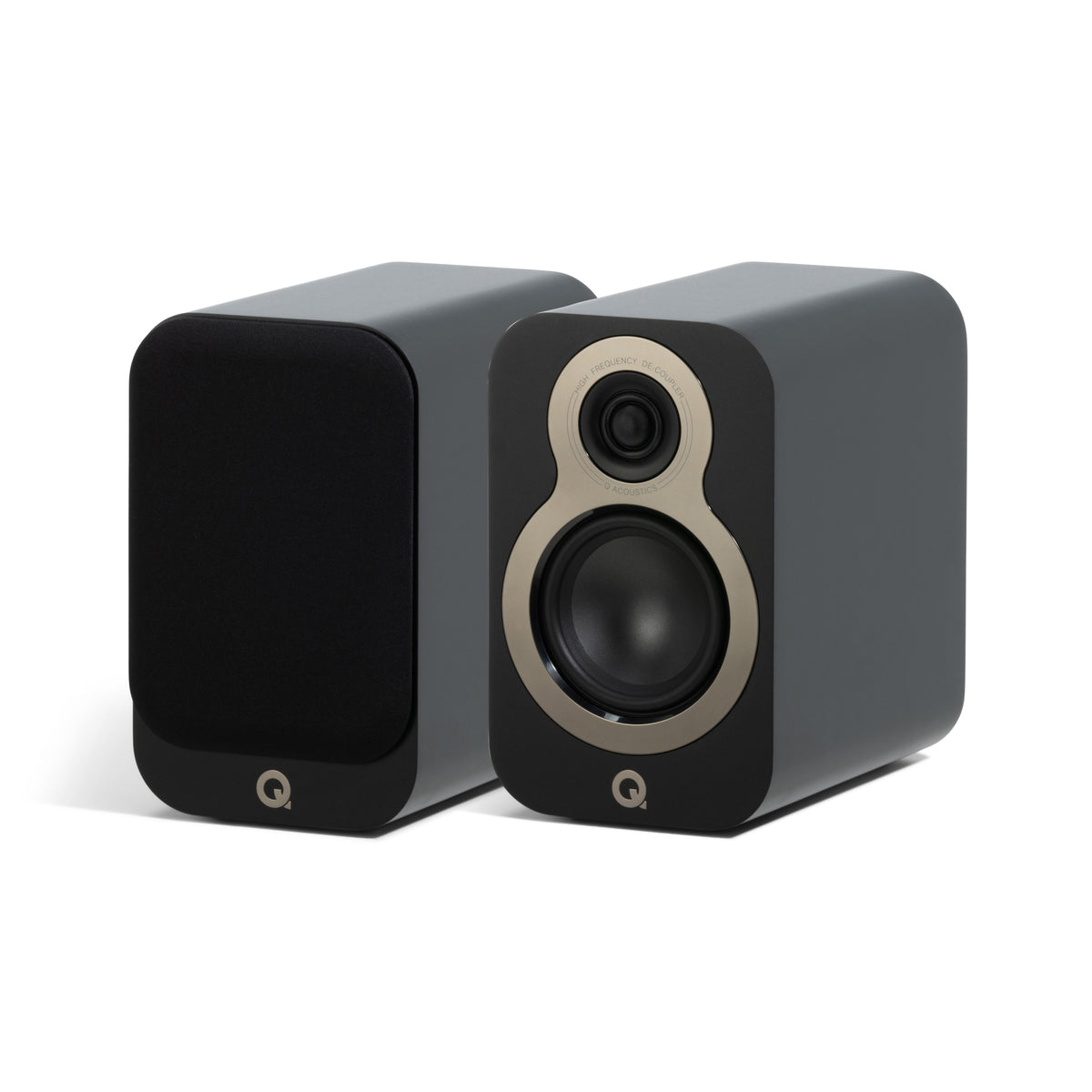 A Black Q Acoustics 3010c speaker with a silver-colored base and black speaker grills.